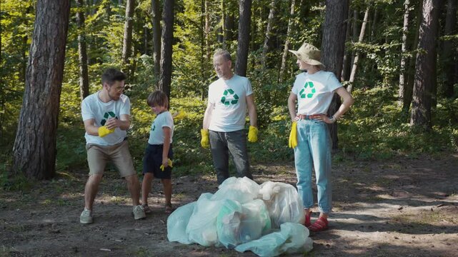 A group confronts littering in a forest, urging environmental action
