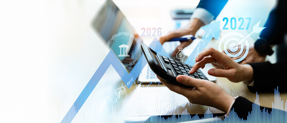Business finance,growth 22027 and investment concept.Businessman calculating and analyzing financial data report with business graph growth chart and world economic,Banking,Stock,finance,Accounting. © Zerofukuman
