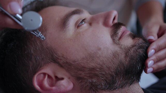 Enjoy a revitalizing Facial Treatment designed for men in a luxurious spa setting