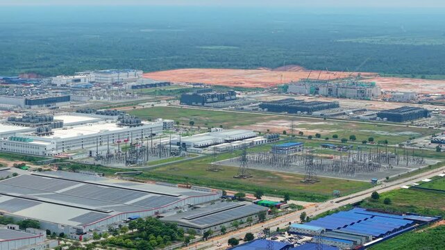 Aerial Tracking View of Grid-Scale Power Substation and Data Center Expansion, Sedenak Tech Park Malaysia