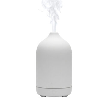White ceramic essential oil aroma diffuser with steam