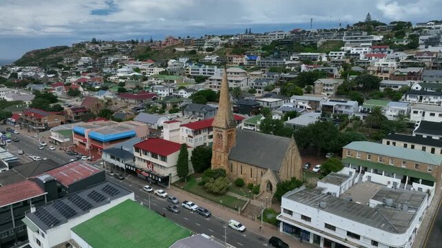 Rotating aerial view of St. Peter's Anglican Church in Mossel Bay, South Africa.