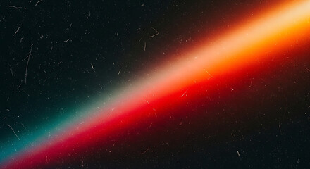 Fototapeta premium Vibrant diagonal rainbow light beam on dark textured background with scratches