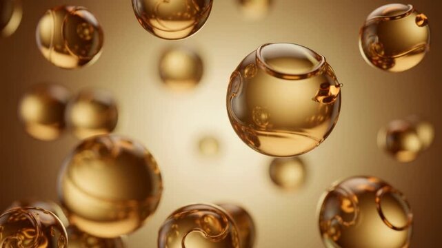 Golden liquid spheres with swirling patterns gracefully floating and rotating in water animation