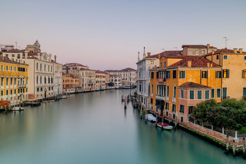 Venice Italy canals and gondola cityscape. Historic architecture and waterfront reflections create an iconic European travel destination. © Chris Chambers