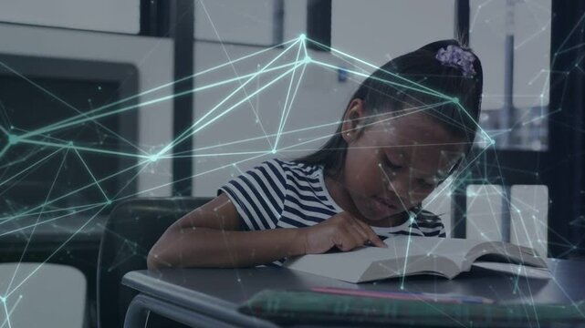 Student following book text with finger at desk initiating animated network overlay for education