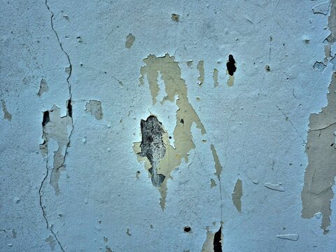Grunge Texture of Peeling Paint on Old Weathered Concrete Wall