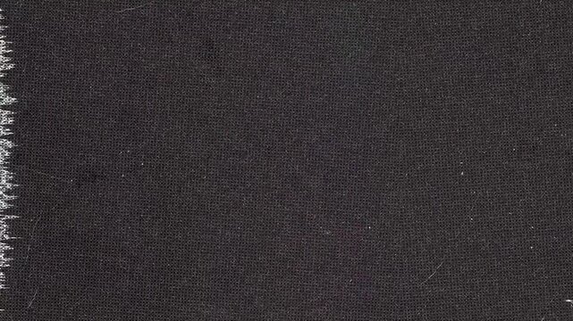 Dark Fabric Texture with Jagged Edge and Subtle Lines