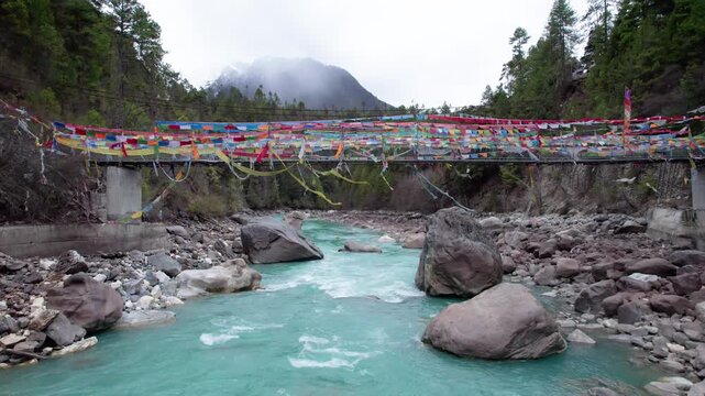 Drone view Parlung Zangbo river running along G318 or China National Highway 318 between Bomi and Baxoi County, Tibet, China, beautiful turquoise water in valley, 4k real time footage travel concept.