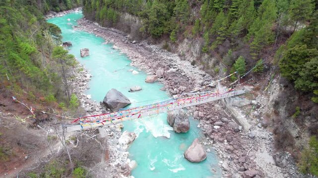 Drone view Parlung Zangbo river running along G318 or China National Highway 318 between Bomi and Baxoi County, Tibet, China, beautiful turquoise water in valley, 4k real time footage travel concept.