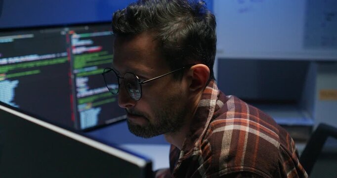 Close-up shot of Computer programmer Dive into the late-night world of programming, where innovation and dedication collide.