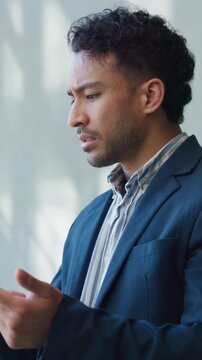 Frustrated, businessman and error with phone in office for software issue or network failure. Angry, man or unresponsive app with smartphone or mistake for lost signal or poor connection in workplace