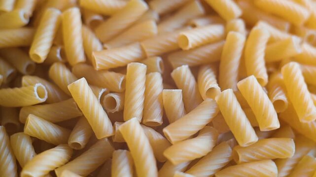 Multiple close-up views show uncooked pasta pieces arranged in an orderly manner. highlight the shapes and textures of the pasta from different angles and distances