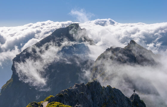 Dramatic mountain landscape with steep peaks partially shrouded in clouds, isle of Madeira Portugal