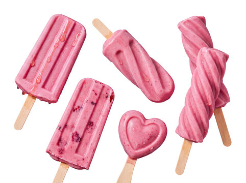 Assorted vibrant pink fruit popsicles with unique shapes and drips, on a clean transparent background.