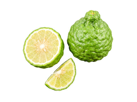 Whole and sliced fresh bergamot fruit with its distinctive bumpy green skin, isolated on a transparent background.