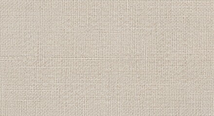 Fototapeta premium Close up view of beige fabric texture displays a consistent woven pattern.
