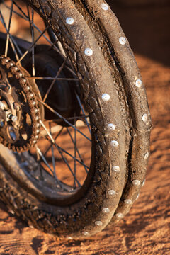 Close-Up of a Spiked Motorcycle Tire for Ice Racing or Off-Road Use in the sand