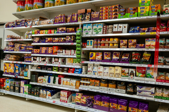 Shelves of gluten, dairy and nut free food on shelves in a Tesco store