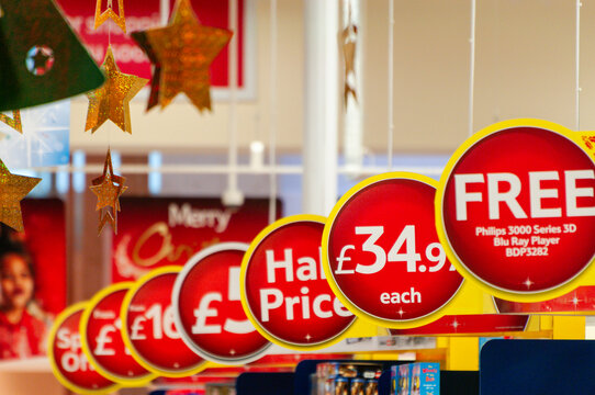 Signs advertising special offers in a Tesco store