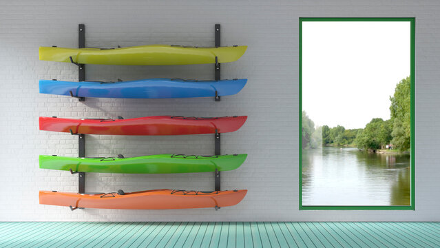 Colorful kayaks stored on an indoor wall rack next to a window
