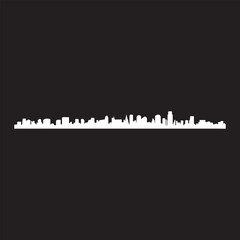 Obraz premium White Cityscape Silhouette Against Black Background for Modern Design Concepts