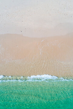 Clear turquoise water meeting the shore The Concept of purity