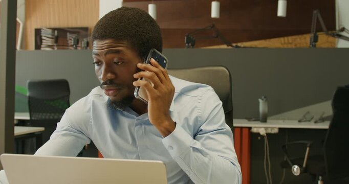 Business professional engaged in serious discussion during quick update