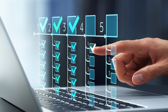 Efficient task management tools and organized to-do lists. Businessman tapping to check off completed tasks.