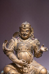 Fototapeta premium The statue of the Heavenly King holding the country in the Qing Dynasty