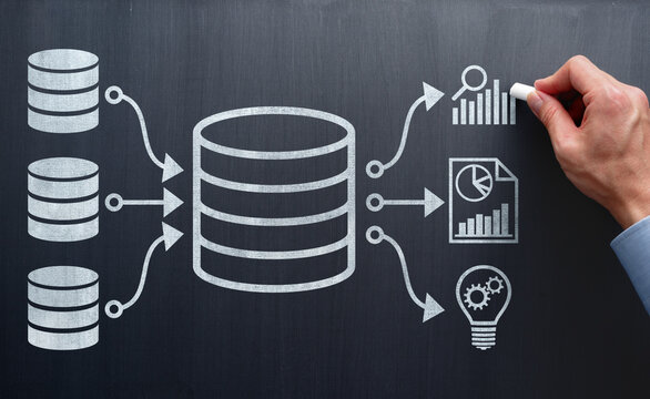 Data warehouse for business data analysis. Database integration for business intelligence. Engineer drawing data flow on blackboard.