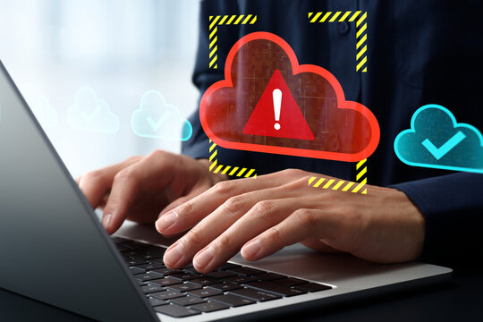 Cloud application unavailable due to system issue or error. Service disruption and technical problem. Businessman unable to access services on laptop computer.