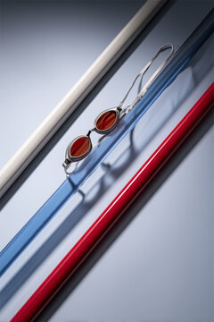 Minimal Aquatic Sports Background Featuring Swim Goggles, Dark Strap and Concrete Texture