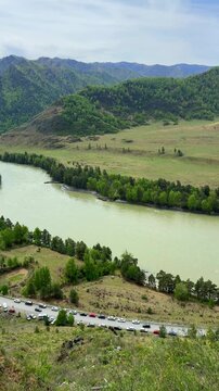 Katun River bend with Patmos Island near Chemal in Altai Republic Russia. Travel destination and landscape exploration in mountain region