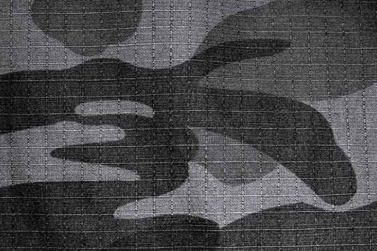 Camouflage fabric pattern background with ripstop texture