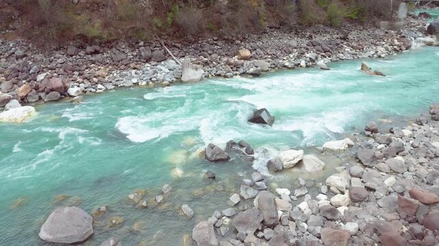 Close up view of Parlung Zangbo river along G318 or China National Highway 318 between Bomi and Baxoi County, Tibet, China, beautiful turquoise water in valley, 4k slow motion footage travel concept.