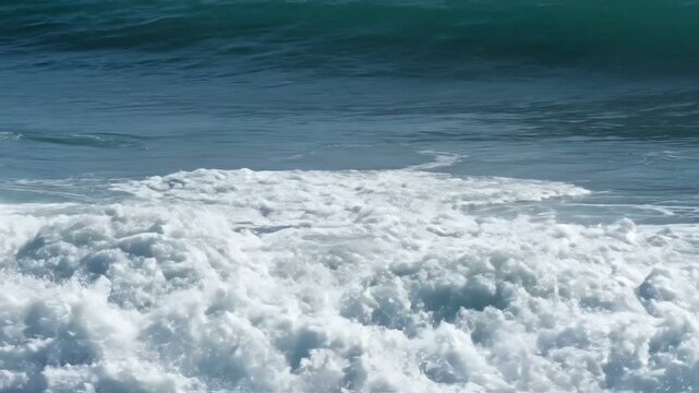Powerful ocean wave breaking with turquoise water and white foam, wild sea nature