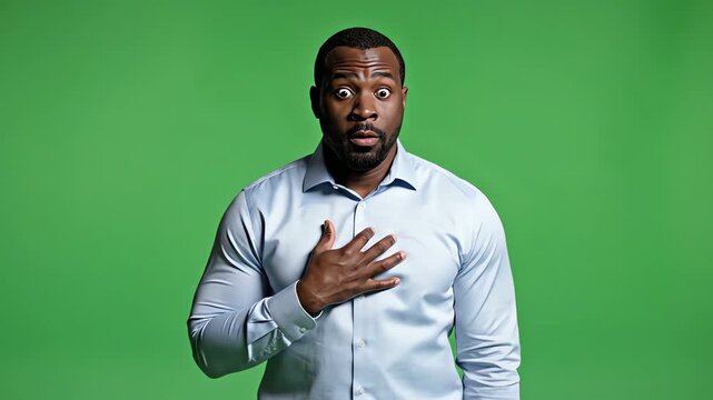 Shocked Black Man with Wide Eyes and Open Mouth on Green Screen