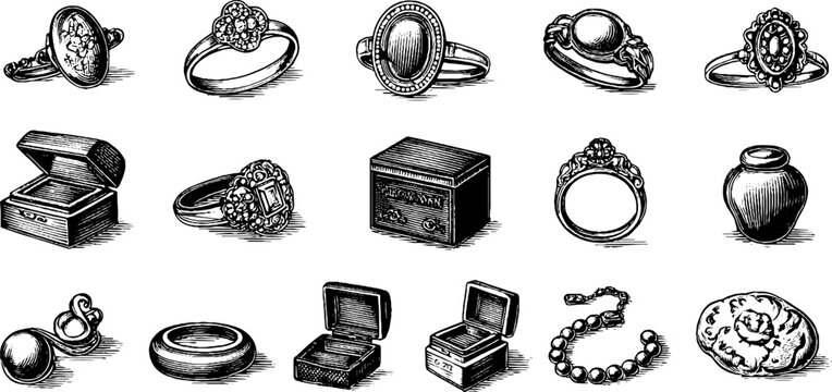 Collection of vintage rings boxes and pearls on white surface