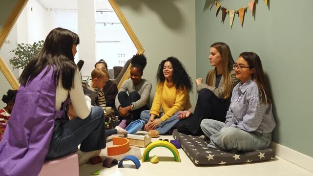 Mothers and children attending a group parenting class