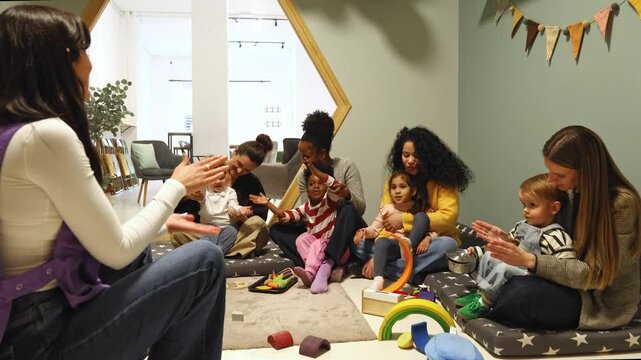 Mothers and children singing together in a playgroup