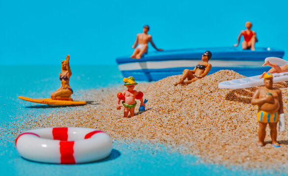 a lifebuoy floating near a miniature beach