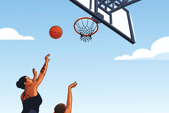 Basketball player jumping high to shoot the ball into the hoop during an outdoor game.