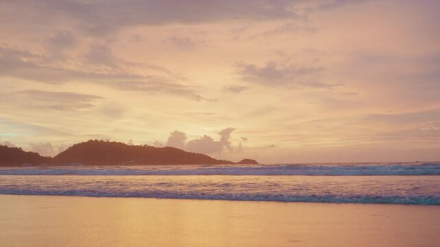 Pink dusk island shoreline with reflections wet sand and gentle surf, pastel sky with cotton clouds, reflective shallow water, cinematic gradient light, intimate tropical mood suited for travel