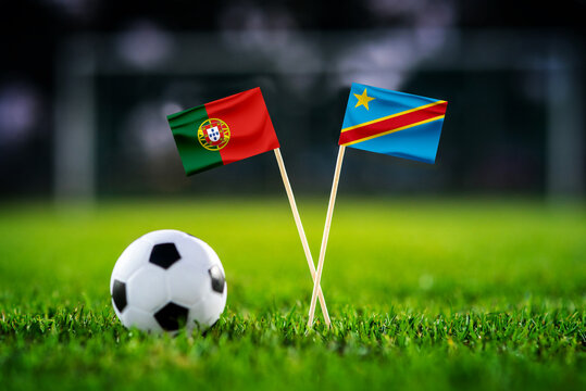 Portugal vs DR Congo, national flags before world championship Group K group stage match, football on green pitch with goal in the background, Houston, USA, June 17, 2026