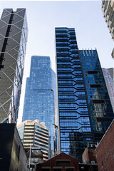 Cluster of modern glass skyscrapers with clear sky in Melbourne Australia © Christine