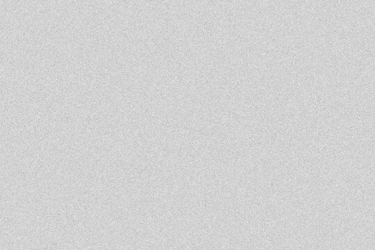 Fine monochrome film grain texture with subtle noise on a clean white background for overlays and abstract graphic use. 
