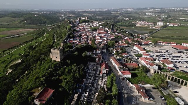 Drone view of Obidos Castle in Portugal, scenic and historic landscape
