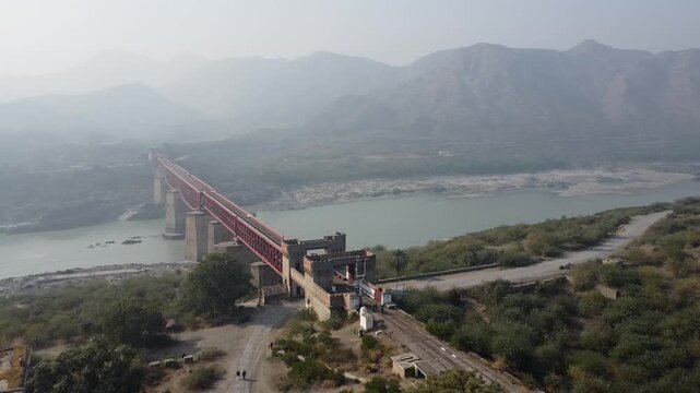 Attock khurd bridge orbit shot showing indus river and stone entrance