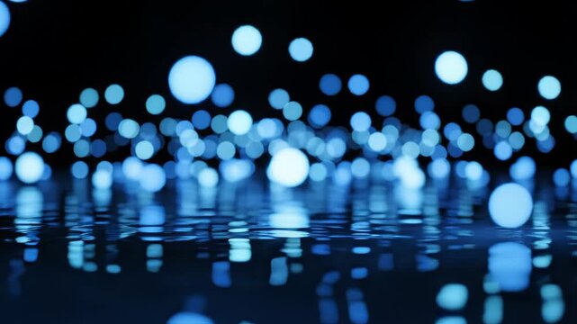 Blue bokeh lights on water surface ideal for sleek commercial backgrounds and title sequences